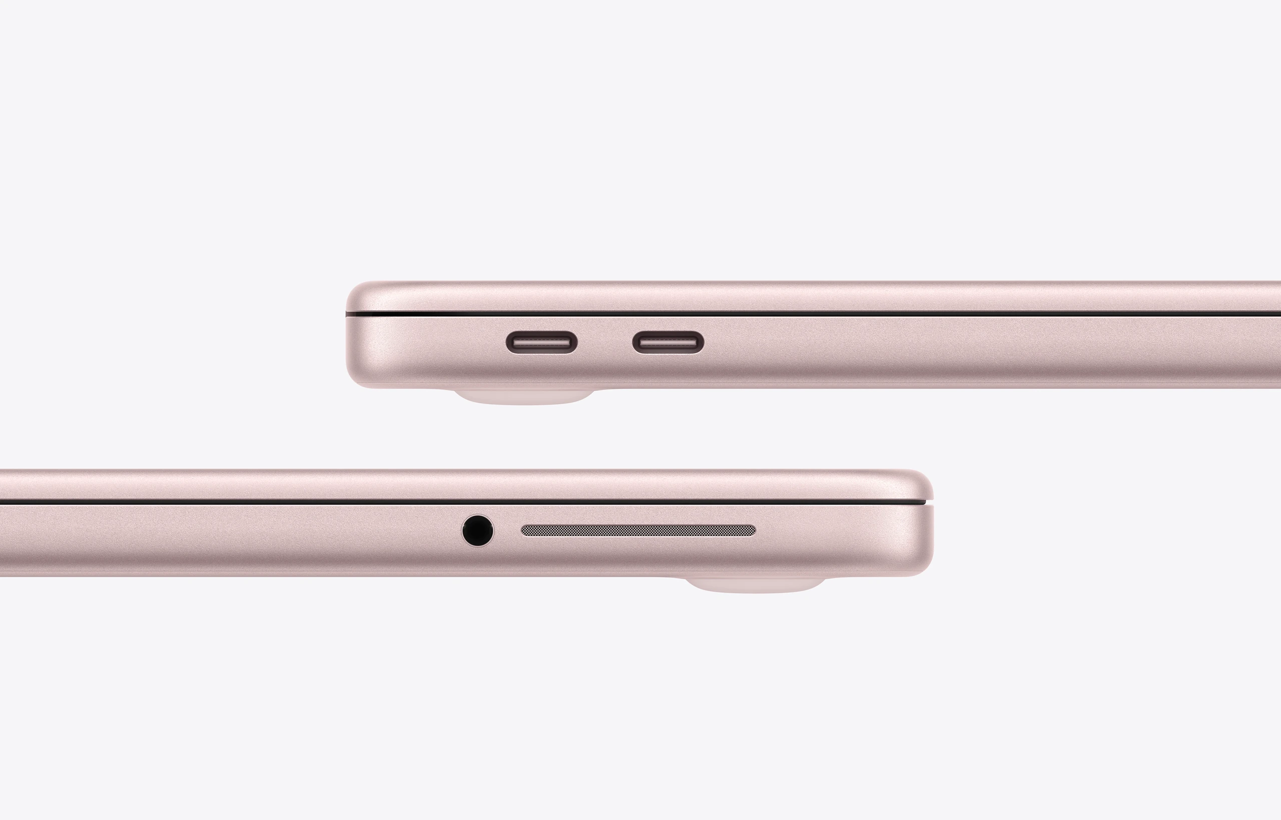 13-inch MacBook Neo, blush (light pink colour) enclosure, lid closed, left side exterior, thin profile, 3.5mm headphone jack, speaker, two USB-C ports